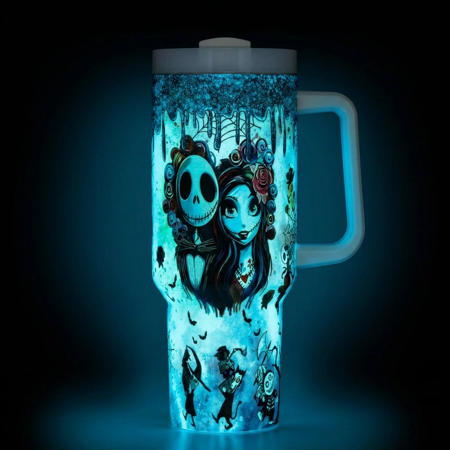 Glow Skeleton Couple 40 Oz Tumbler glowing blue in the dark